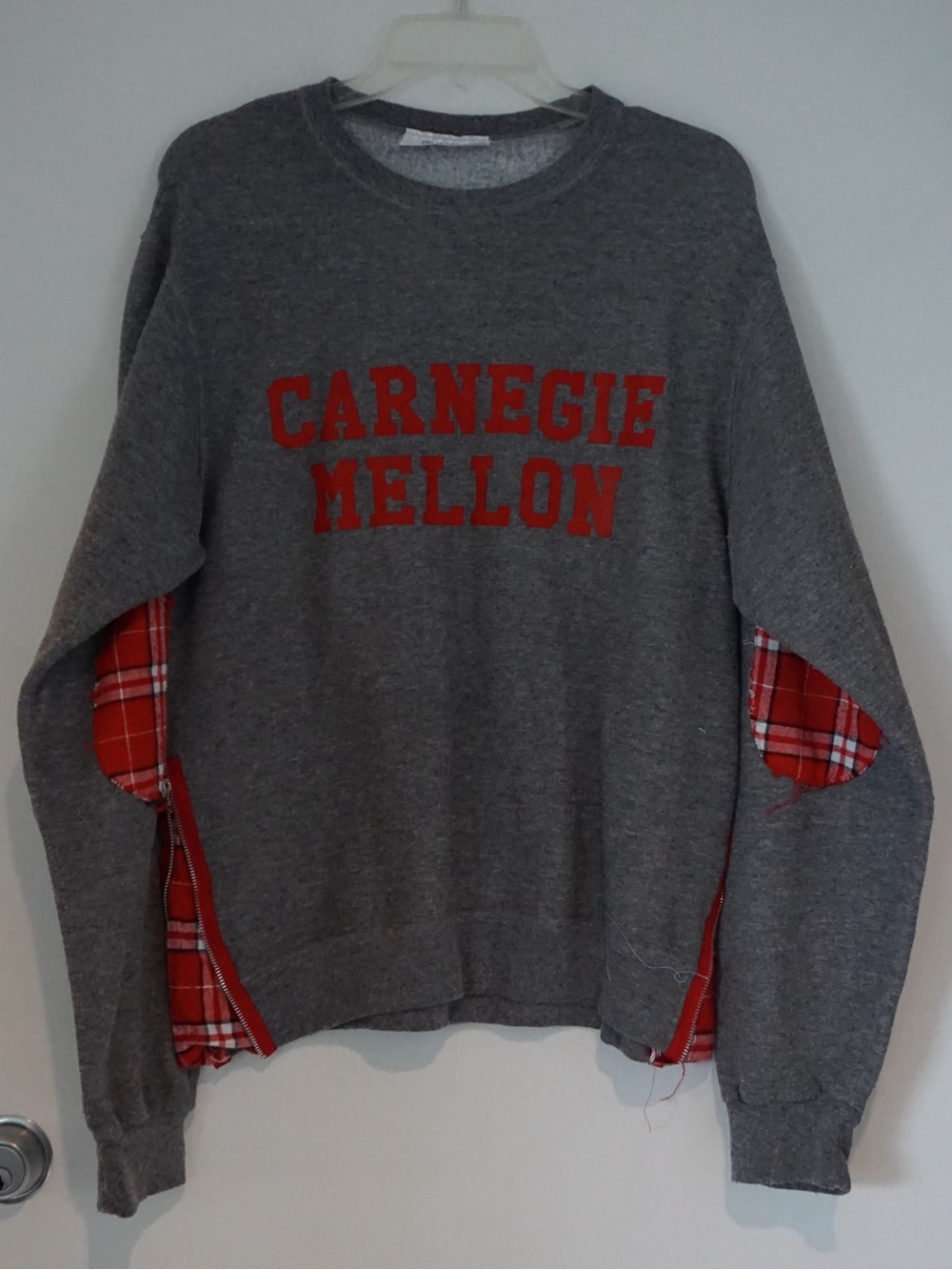 Carnegie Mellon gray crewneck with red text and red flannel elbows